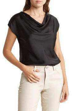 Go from desk to dinner in this lustrous satin top fashioned with a gracefully draped cowl neck and dolman cap sleeves. Cowl neck Cap sleeves 97% polyester, 3% spandex Machine wash, line dry Imported Model stats: 5'10" height, 32" bust, 25" waist, 36" hip. Model is wearing size Small.