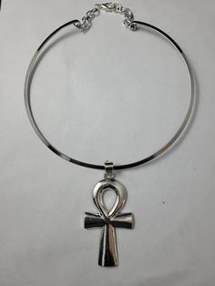 "Beautiful necklace features a 3 1/2\" silver plated ankh on a 15\" silver plated choker.  Please come back and visit to check for new unique designs.  For more styles visit my Etsy shop: www.etsy.com/shop/SoftlySisterDesigns" Cheap Ankh Spiritual Jewelry, Cheap Spiritual Ankh Jewelry, Cheap Ankh-shaped Spiritual Jewelry, Cheap Ankh Shaped Spiritual Jewelry, Cheap Ankh Shaped Metal Jewelry, Cheap Black Spiritual Necklaces, Cheap Bohemian Ankh Jewelry, Affordable Black Spiritual Necklaces, Cheap Ankh Necklace As Gift