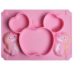 a pink tray with mickey mouse shaped food items