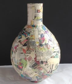 a vase with many different pictures on it