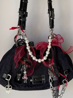 decorated bag, coquette, decorate idea, bows, red and black Decorate Bags Diy, Goth Bags Handbags, Jane Birkin Bag Accessories, Red And Black Purse, Handbag Accessories Ideas, Decorated Bags Aesthetic, Decorated Bags Ideas, Purse Decoration Ideas, Decorate Bag Ideas