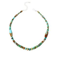 Jay King Multicolor Azure Peaks Turquoise Bead Necklace Dark-colored inclusions give these beautiful beads of Mongolian turquoise a natural, rugged look that's sure to add a touch of casual chic to any outfit. From Jay King.       Approx. 18-1/2"L x 7/16"W with 2-3/4" extender     Stamped .925     Hook closure     Necklace has rondelle-, barrel-, round and freeform-shaped multicolor turquoise beads in single strand   Stone Information       All sizes and weights approximate     Stabilized Multic Casual Turquoise Necklaces With Colorful Beads, Earthy Turquoise Beaded Necklaces With Round Beads, Rustic Turquoise Beaded Necklaces With Natural Stones, Rustic Turquoise Necklaces With Natural Stones, Earthy Turquoise Gemstone Beaded Necklaces, Earthy Turquoise Beaded Necklaces, Chokers Indian, King Jewelry, Jewelry King