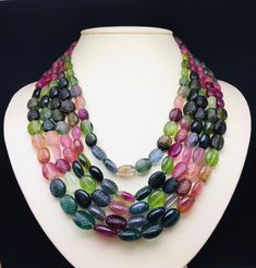 100 % Natural Multi Tourmaline carved oval shape beaded necklace with adjustable silk cord closure. Details: - Gemstone - Multi Tourmaline Shape - Oval Strand - 5 Calibration of beads - 8x10 millimeters till 13x18 millimeters Gross weight - 1442.50 carat Net weight - 1404.00 carat Length - 20 Inches ( Inner ) and 24 Inches ( Outer ) SKU - HJSPSAR0077 100% NATURAL MULTI TOURMALINE NOT HEATED NOT TREATED NOT DYED VERY RARE NECKLACE TO FIND EACH BEAD IN THE NECKLACE IS PERFECTLY HAND CARVED BY BEST Cheap Multi-strand Polished Bead Necklaces, Luxury Beaded Necklaces With Large Oval Beads, Luxury Multicolor Beaded Necklaces With Round Beads, Luxury Multi-strand Beaded Necklaces For Party, Luxury Handmade Multicolor Beaded Necklaces, Luxury Unique Multi-stone Beaded Necklaces, Luxury Multi-strand Necklace With Colorful Beads, Luxury Necklaces With Large Oval Beads, Luxury Unique Necklace With Oval Beads