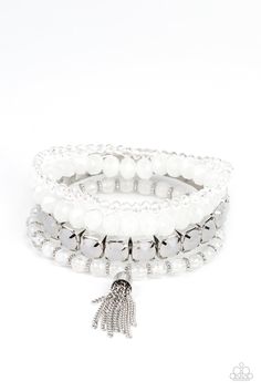 Pinched in silver fittings, a stretchy band of dewy white beads joins mismatched strands of cloudy and glassy white crystal-like and stretchy bracelets around the wrist. A single silver chain tassel dances from the crystalline compilation for a final flirty finesse. Sold as one set of four bracelets. White Sparkling Bracelet, Party White Crystal Bracelet With Rhinestones, White Beaded Metal Crystal Bracelet, White Sparkling Crystal Bracelets, Silver Crystal Bracelet With Hand-set Details, Paparazzi Jewelry Images, White Bracelet, Feeling Pretty, Iridescent Crystal