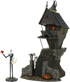 the skeleton is holding an umbrella and standing next to a house