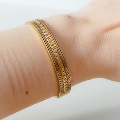 High-quality gold-plated cuff bracelet bangle is decorated with and knit ethnic pattern. You can see our modern and dainty gold cuff bracelet bangle models as a perfect jewelry option for daily use or special occasions. WHO IS IT AN IDEAL GIFT FOR? It is ideal for engagement and bridal jewelry gifts, wedding gifts, engagement gifts, mother's day gifts, birthday gifts, bachelorette gifts, graduation gifts, anniversary gifts, celebration gifts, in short, gifts for all women, especially those about Gold Metal Braided Bangle Bracelet, Gold Metal Bangle Braided Bracelet, Bohemian Gold Bracelets For Gift, Handmade Gold Braided Brass Bracelets, Bohemian Gold Bracelet As A Gift, Bohemian Gold Bracelet For Gift, Bohemian Yellow Gold Bangle Bracelets, Yellow Gold Bohemian Bangle Bracelets, Bohemian Yellow Gold Bangle Bracelet