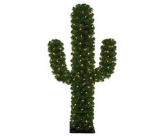 a large cactus shaped plant with lights on it's sides and the top part of its trunk