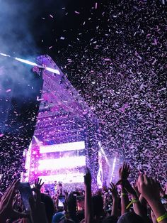 confetti is thrown in the air at a concert