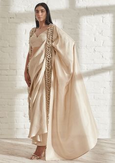 Understated yet makes a statement. The hand beaded pearl bead jacket lends an elegant touch to the pre draped masai godet sari. Layer it over any soft color outfit or over your favorite white shirt. Pair it with our plain Gatsby blouse. Draping Saree Style, Indian Outfits Lehenga, Latest Bridal Dresses, Draping Fashion, Beaded Jacket, Ruffles Fashion, Dress Indian Style, Gold Silk, Indian Designer Outfits