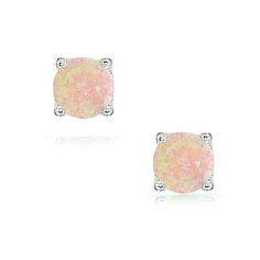 Think pink with these super sweet stud earrings. Our candy colored Created Opal jewelry is made of shining sterling silver and round cut Created Opal stones. The pastel pink, green, and white shades of these gemstones studs are an adorable addition to any look, whether you wear them with casual clothes like jeans and a t shirt, or use them to add a pop of color to a dressed up outfit. They are perfect for all the October  out there since they make perfect birthstone jewelry for those born in tha Pink Round Earrings With Prong Setting, Pink Prong Set Round Earrings, White Round Stone Earrings For Gift, Hypoallergenic Round Pink Jewelry, Hypoallergenic Pink Round Jewelry, Pink Hypoallergenic Jewelry, Pink Round Sterling Silver Earrings, Pink Sterling Silver Round Earrings, Pink Gemstone Round Earrings