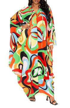 A vibrant geo print swirls on this flowy caftan designed with voluminous dolman sleeves and slender neck ties. Split neck Long sleeves Unlined 100% polyester Hand wash, line dry Imported Spring Multicolor Kaftan With Colorful Pattern, Spring Multicolor Patterned Kaftan, Multicolor Abstract Print Kaftan For Spring, Spring Multicolor Kaftan With Abstract Print, Spring Multicolor Abstract Print Kaftan, Multicolor Long Sleeve Kaftan With Vibrant Print, Oversized Multicolor Kaftan With Batwing Sleeves, Multicolor Flowy Long Sleeve Kaftan, Slender Neck