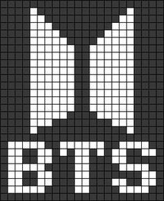 a cross - stitch pattern with the shape of a cat's head in black and white