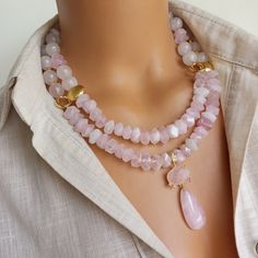 Enhance your boho style with this stunning Pink Quartz Necklace. This stunning natural stone beaded necklace features a pendant made of beautiful pink quartz gemstone that radiates positive energy and feminine elegance. Perfect for everyday wear or special occasions, this unique quartz jewelry makes a thoughtful gift for women who appreciate natural beauty and elegant appeal. MATERIALS: Pink Quartz gemstones: These genuine gemstones, extracted from the depths of the earth, add depth and mystery Bohemian Pink Crystal Necklaces With Faceted Beads, Bohemian Pink Crystal Necklace With Faceted Beads, Pink Bohemian Crystal Necklace With Faceted Beads, Pink Crystal Necklace With Natural Stones, Bohemian Pink Crystal Necklace With Gemstone Beads, Pink Bohemian Crystal Necklace With Gemstone Beads, Rose Quartz Gemstone Necklaces With Round Beads, Rose Quartz Pendant Necklace With Natural Stones, Rose Quartz Pendant Crystal Necklace With Natural Stones