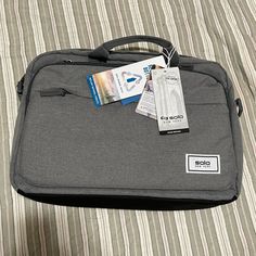 Brand New Solo Laptop Bag 15.9 Inches With Tags Never Been Used Stored Away. Thanks For Looking. Gray Laptop Bag For Daily Use, Binder Folder, Binders, Laptop Bag, Laptop, Brand New, Tags, Red, Color