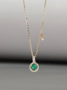 NOT GOLD PLATED, NOT GOLD FILLED! All our jewelry are stamped with a gold hallmark to certify the metal purity of the item. Product Details ☑14K SOLID GOLD ☑EMERALD CZ: 3MM ☑WHITE CZ: 1.5MM ☑CHAIN LENGTH: 40CM ☑CHAIN THICKNESS: 0.7MM 💓Tarnish resistant and sweat resistant  💓Hypoallergenic, made without lead, nickel and cadmium Gold Information *9K gold is 9 parts pure gold or 37.5% pure. *10K gold is 10 parts pure gold or 41.7% pure. *14K gold is 14 parts pure gold or 58.5% pure. *18K gold is 14k Yellow Gold Jewelry For May Birthstone, Elegant Gold Emerald Necklace With Round Pendant, Dainty Gold Emerald Necklace For Formal Occasions, Elegant Gold Emerald Necklace, Gold Round Emerald Necklace Hallmarked, Gold Round Hallmarked Emerald Necklace, Gold Dainty Emerald Necklace, Gold Emerald Necklace With Round Birthstone, Classic Gold Emerald Birthstone Necklace