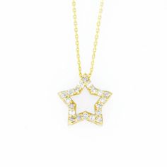 This is a beautiful diamond design necklace. It is set in real solid 14Kt Gold. The Pendant and chain are both 14Kt Gold. You can choose if you want 14Kt White Gold, 14Kt Yellow Gold or 14Kt Rose Gold. This is the perfect gift for mom, wife, fiancee, girlfriend, valentine, daughter, family or friend. It is a special gift for mother's day, valentine's day, wedding, anniversary, birthday, Christmas, Easter, New Year's and any holiday. Star Size: 9.55mm (0.376 inches) 2.80mm Width Total Diamonds: 2 Diamond Star Necklace, Perfect Gift For Mom, Diamond Pendant Necklace, Diamond Design, Gold Stars, 14kt Gold, Mother Day Gifts, Diamond Pendant, Beautiful Necklaces