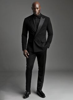 Be the essence of timeless allure and infuse a hint of refinement to your fashion with our Black Smoking Double Breasted Tuxedo Suit that brings a touch of flair to your appearance. Made from a merino wool fabric that boasts a cozy and delicate feel against your skin and a sleek black color to effortlessly complement your stylish choices. Whether you seek a suave or polished outfit for your next style affair, our double-breasted black jacket will make you the epitome of perfection.     Look Inc Wedding Suits Groom Tuxedos, Black Dinner Suits For Men, Wedding Tux Ideas For Men, Grand Ball Outfit Men, Groom All Black Tuxedo, Full Black Wedding Suit, Big And Tall Tuxedo Mens Fashion, Black On Black Mens Suit, Men’s Black Tuxedo