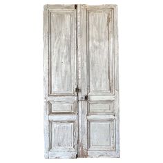 an old white double door is shown against a white background