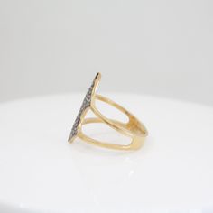 Experience the epitome of luxury and sophistication with our 14k Gold Vermeil .925 Sterling Silver Valyrian Shield Ring. Meticulously handcrafted to perfection, this exquisite piece features a pavé setting of natural, ethically sourced diamonds from India. The pointed shield design, combined with the elegant pavé setting, creates a timeless and refined look, perfect for elevating any ensemble. SPECIFICATIONS: Gross Weight: 3.300 grams Diamond Weight: 0.75 carats INGREDIENTS: Gemstone: Natural Di Shield Ring, Shield Design, Gold Filled Earrings, Pave Diamonds, Earring Necklace, Ring Necklace, Gold Vermeil, Ring Shopping, Jewelry Shop