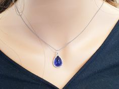 15.43 Carat Tanzanite and Diamond Pendant Necklace in 18 Karat White Gold For Sale at 1stDibs Formal Tanzanite Teardrop Jewelry, White Gold Tanzanite Jewelry In Pear Shape, Formal Tanzanite Pear-shaped Jewelry, Pear-shaped Tanzanite Formal Jewelry, Formal Pear-shaped Tanzanite Jewelry, Gold For Sale, Tanzanite Diamond, Teardrop Pendant, Diamond Pendant Necklace