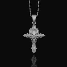 Silver Gothic Skull Cross Necklace, Wooden Texture Design, Unique Dark Aesthetic Jewelry Dive deep into the world of dark aesthetics with our Gothic Skull Cross necklace. Crafted with a unique wooden texture, this silver gothic piece epitomizes dark fashion. Whether you're into Gothic jewelry or just looking to add a touch of edginess, this necklace—with its wood-like cross and detailed skull pendant—is the perfect accessory for any dark ensemble. ✦ Jewelry Details ✦ • Material: 925 Sterling Silver • Pendant's Dimensions: 27x36mm • Weight: 13-14 grams • Finish: Oxidized, Polished, Gold, Rose Gold • Stamp: 925 • Bail: 4mm • Ideal for daily use with an oxidized finish on 925 sterling silver, which makes details more attractive and eye-catching! • It can also be made in 8K - 10K - 14K - 18K w Gothic Cross Pendant Jewelry For Halloween, Cross-shaped Halloween Jewelry Gift, Halloween Spiritual Skull Jewelry, Halloween Gift Necklace With Cross Pendant, Halloween Gift Cross Pendant Necklace, Dark Aesthetics, Wooden Texture, Aesthetic Jewelry, Gothic Skull