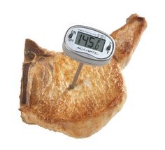 a piece of meat with an electronic thermometer on it's back end