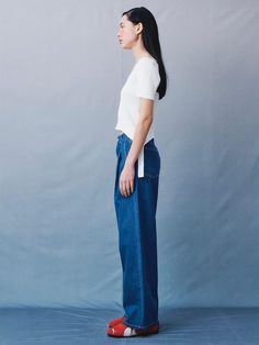 This product takes a fresh approach to denim with a semi-wide leg that captures a blend of classic style and modern comfort. The design provides a versatile foundation for a variety of looks, from casual days out to more polished ensembles. With a focus on ease of wear, these pants feature a comfortable cut that doesn't sacrifice on style. - The semi-wide leg silhouette offers a contemporary twist on the traditional denim look.- Constructed for comfort, these pants come with a relaxed fit through the hips and thighs.- They feature classic denim detailing such as contrast stitching and a five-pocket design.- Designed to be a staple in any wardrobe, they pair well with both fitted tops for contrast or oversized sweaters for a cozy vibe. Classic Wide-leg Spring Jeans, Classic Wide-leg Jeans For Spring, Classic Spring Wide-leg Jeans, Spring Classic Wide-leg Jeans, Modern Jeans For Everyday Summer Wear, Modern Cropped Leg Pants For Everyday, Modern Cropped Pants For Everyday, Versatile Everyday Wide-leg Jeans, Modern Dark Wash Summer Jeans