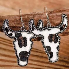 Silvertone & Cow-Print Longhorn Drop Earrings Add A Boho Touch To Your Wardrobe With This Set Of Earrings Featuring A Cow-Themed Drop Design. Brass-Plated Rhodium / Polyurethane Leather 1.5'' W X 2'' L Cowgirl, Cowboy, Boho, Western, Southwest, Yellowstone, Festival, Vacation, Country, Line Dancing, Party, Steer, Cow, Leopard, Stud, Dangle, Drop, Cute Earrings Country Earrings, Southern Jewelry, Western Fashion Jewelry, Cow Stuff, Earrings Outfit, Country Jewelry, Cowgirl Bling, Western Wear Outfits, Cowgirl Jewelry