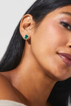 Add a luxurious and romantic touch to your everyday look. Featuring a classic elevated stud style with an emerald-green colored stone for a pop of color, these earrings exude everyday elegance. Emerald Studs, Emerald Halo, Classy Earrings, Halo Stud Earrings, Emerald Earrings Studs, Everyday Elegance, Stud Style, Halo Earrings Studs, Colored Stone