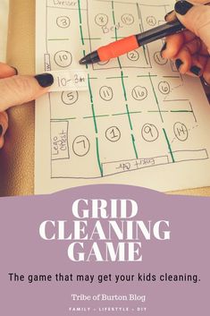 two hands holding pens over a paper with the words grid cleaning game on it