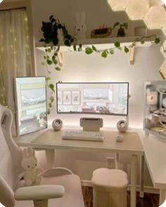 a computer desk with two monitors and a keyboard