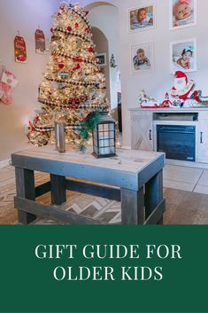 a christmas tree sitting on top of a wooden table