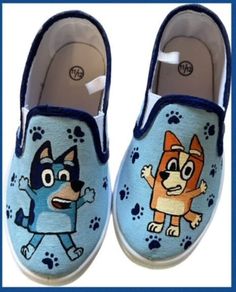 Bluey and Bingo hand painted canvas slip on shoes  Can personalize with your child's name on the side Bluey Shoes Diy, Blue Sneakers With Custom Artwork, Hand Painted Canvas Shoes With Round Toe, Hand Painted Round Toe Canvas Shoes, Bluey Cartoon Painted Shoes, Hand-painted Canvas Shoes With Round Toe, Bluey Socks Heeler, Bluey Characters Socks, Bluey Socks