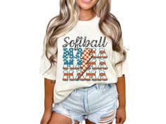 Celebrate your softball mom pride with our patriotic softball mama shirt, featuring red, white, and blue American flag letters and a retro checkered lightning bolt down the middle. With short sleeves and a crewneck design, this tee is the perfect gift for any mom who loves softball, perfect for cheering on your favorite player at the ballpark or celebrating the Fourth of July in true American baseball style. COMFORT COLORS 1717 SHIRT: Unisex 100% US cotton - ethically grown and harvested Pre-Shr White Casual T-shirt For Cheerleading, Sporty White Tops With American Flag Print, Casual T-shirt For Cheerleading During Baseball Season, Softball Mama, Blue American Flag, Mom Pride, T Ball, Mama Tshirts, True American