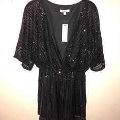 Brand New! Never Worn Before Sparkly Black Romper. Perfect For A Bachelorette Party Or Any Special Occasion. Black Sequined Jumpsuits And Rompers For Party, Black Sequined Jumpsuits And Rompers For Cocktail, Black Sequined Jumpsuit For Party, Black V-neck Jumpsuits For Party Season, Black Holiday Party Jumpsuits And Rompers, Black Jumpsuits And Rompers For Holiday Party, Black Jumpsuits And Rompers For Party Holiday, Black Jumpsuits And Rompers For Fall Party, Black Jumpsuit For Holiday Party