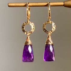 💎 Elegant, lovely yet pretty Purple Amethyst Earrings in 14K Gold Filled💎 🍀 Gemstones : Approximately 8mm x 16mm Faceted Natural Purple Amethyst 🍀 Earring size : Approximately 41 mm long  🍀 All materials are High Quality 14K Gold Filled, Nickel FREE, suitable for sensitive skin.   🍀 Healing Properties : Amethyst is a naturally powerful stone of spiritual protection and purification that clearing the mind, bring peace and getting balanced in your body and soul.  It is widely believed to be Amethyst Dangle Earrings Fine Jewelry, Fine Jewelry Amethyst Dangle Earrings, Amethyst Drop Earrings For Anniversary, Gold Amethyst Earrings Fine Jewelry, Dangle Earrings With Gemstone Accents For Anniversary, Amethyst Dangle Earrings For Anniversary, Purple Faceted Earrings For Anniversary, Gold Amethyst Earrings With Gemstone Accents, Purple 14k Gold Dangle Jewelry