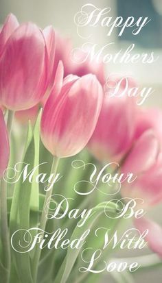 pink tulips in a vase with the words happy mothers day