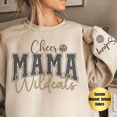 Elevate team spirit with our Custom Cheer Mom Sweatshirt - a cozy blend of comfort and personalization. Ideal for any occasion, this unisex heavy blend crewneck sweatshirt offers pure comfort with a touch of style. Crafted from a medium-heavy fabric blend of 50% cotton and 50% polyester (8.0 oz/yd this sweatshirt provides a warm and cozy feel, making it the perfect choice for those colder months. The classic fit, paired with the crew neckline, ensures a comfortable and clean-cut style - a versat Cheer Mom Sweatshirt, Cheer Mom Sweatshirt Ideas, Cheer Mom Outfit Ideas, Cheer Mom Outfit, Pom Mom Shirts, Cheer Designs, Cheer Coach Shirts, Cheerleading Mom, Pom Mom