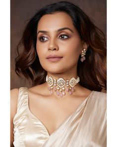 Kundan Polki Pearly Antique Choker Set - Joules By Radhika This designer handcrafted choker necklace & earring set is made with enamelled pendants etched with polkis & motifs. It has pink quartz drops & is completed with classic pearl beading.Ideal to be worn on festive, wedding & party occassions on your Indian & fusion attire. Every artistic piece from Joules by Radhika is made with real semi precious stones only, giving it a regal look & feel. Necklace has adjustable locking system to fit all Kundan Polki Choker Set, Luxury Elegant Pink Kundan Necklace, Luxury Pink Kundan Necklace For Wedding, Meenakari Chandbali Choker, Elegant Pink Meenakari Choker, Handmade Pink Bridal Necklace, Pink Cutdana Jewelry Gift, Bridal Jewellery Online, Antique Choker