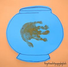 a drawing of a hand in a fish bowl with blue water and gold paint on it