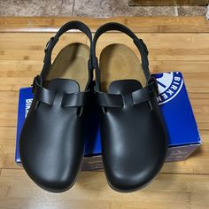 Basically Brand New Black Leather Clog Birkenstocks On Worn Twice For A Company Event For The Brand. Willing To Negotiate Price A Little. Message Me For Any Questions. Classic Black Clogs With Cushioned Footbed, Black Leather Footbed Clogs With Round Toe, Black Clogs With Cushioned Footbed And Round Toe, Black Clogs With Cushioned Footbed And Flat Heel, Black Closed Toe Clogs With Removable Insole, Black Clogs With Leather Sole And Flat Heel, Classic Black Clogs With Flat Heel, Classic Black Flat Heel Clogs, Black Leather Clogs With Removable Insole