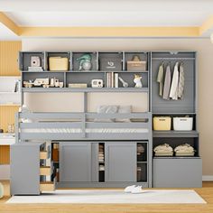 a loft bed with built - in shelves and drawers