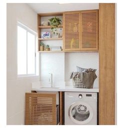 a washer and dryer in a small room