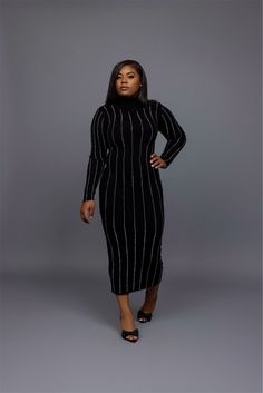 Step out in style with this sleek black turtleneck midi dress, designed for the woman who loves a chic, understated look with a hint of edge. Featuring shimmering rhinestone pinstripes that elongate the figure, this dress offers a sophisticated silhouette that hugs your curves in all the right places. The turtleneck design adds a polished touch, while the fitted long sleeves keep the look elegant and versatile. Perfect for both formal and semi-casual occasions, this dress is easy to style with h Stretch Turtleneck Midi Dress For Party, Fitted Turtleneck Midi Dress For Party, Winter Evening Turtleneck Midi Dress, Chic Turtleneck Midi Dress For Party, Spring Evening Turtleneck Midi Dress, Glamorous Knee-length Winter Midi Dress, Black Fitted Turtleneck Midi Dress, Black Turtleneck Midi Dress, Fitted, Black Turtleneck Dress For Party