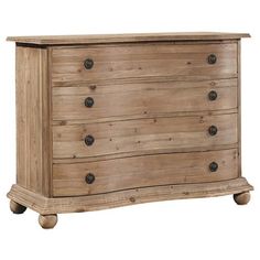 a wooden dresser with four drawers and two knobs on the front, against a white background