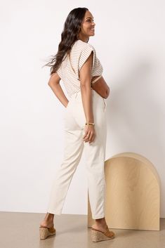 Perfect for work or weekend, the Caden Trouser by AG is crafted in soft stretch twill fabric and features a relaxed, tapered leg, mid-rise fit, and ankle-length hems. | AG Women's Caden Trouser Pants, Size 27, White Chic Cotton Ankle-length Chinos, Chic Relaxed Fit Ankle-length Chinos, Chic Cotton Chinos With Tapered Leg, Chic Tapered Leg Chinos For Workwear, Chic Relaxed Fit Chinos For Business Casual, Chic Beige Chinos For Work, Spring Workwear Tapered Leg Chinos, Ankle-length Chinos For Spring Workwear, Spring Ankle-length Chinos For Workwear