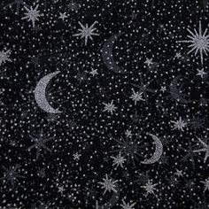 the stars and moon pattern is black with silver sparkles on it's surface