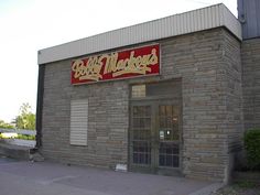 an old brick building with a sign that says bob's masheds on it