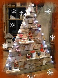 a christmas tree made out of wooden pallets