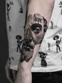 a man with a tattoo on his arm that says hope and an image of abraham lincoln